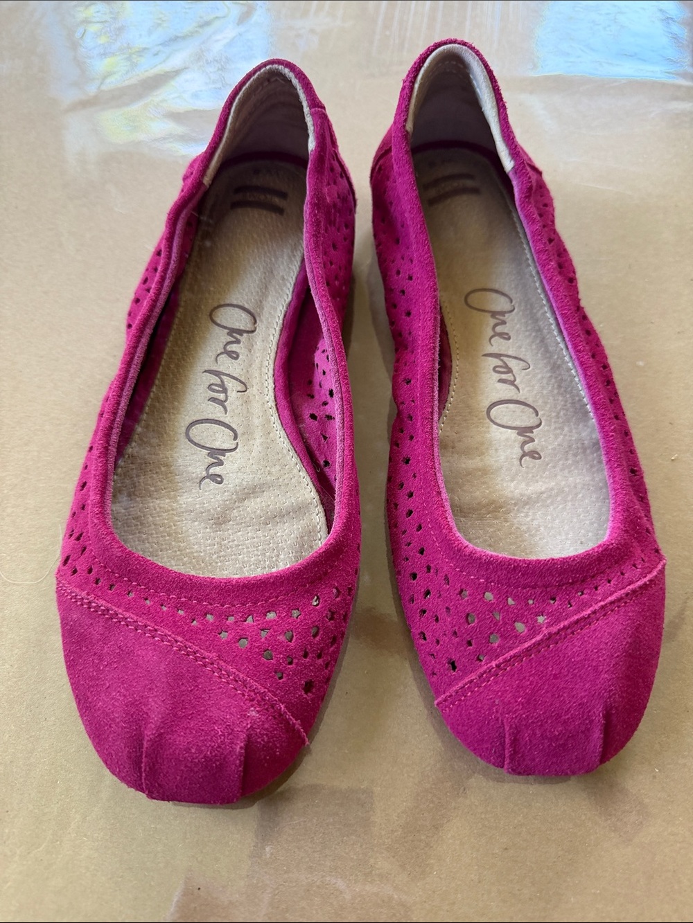 TOMS fuchsia pink suede perforated ballet flats